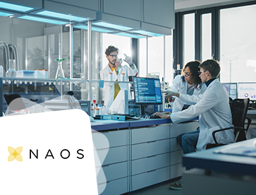 Three scientists in a modern lab with NAOS logo overlay.
