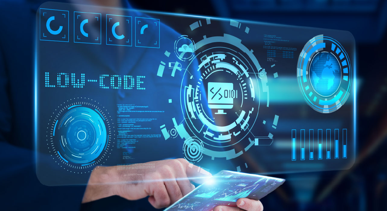 A person interacts with a futuristic digital interface showcasing "Low-Code," with blue holographic elements, gears, and a touchscreen. High-tech ambiance.
