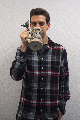 Man drinking from a mug