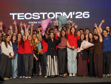 Participants on stage celebrating at TecStorm’26.